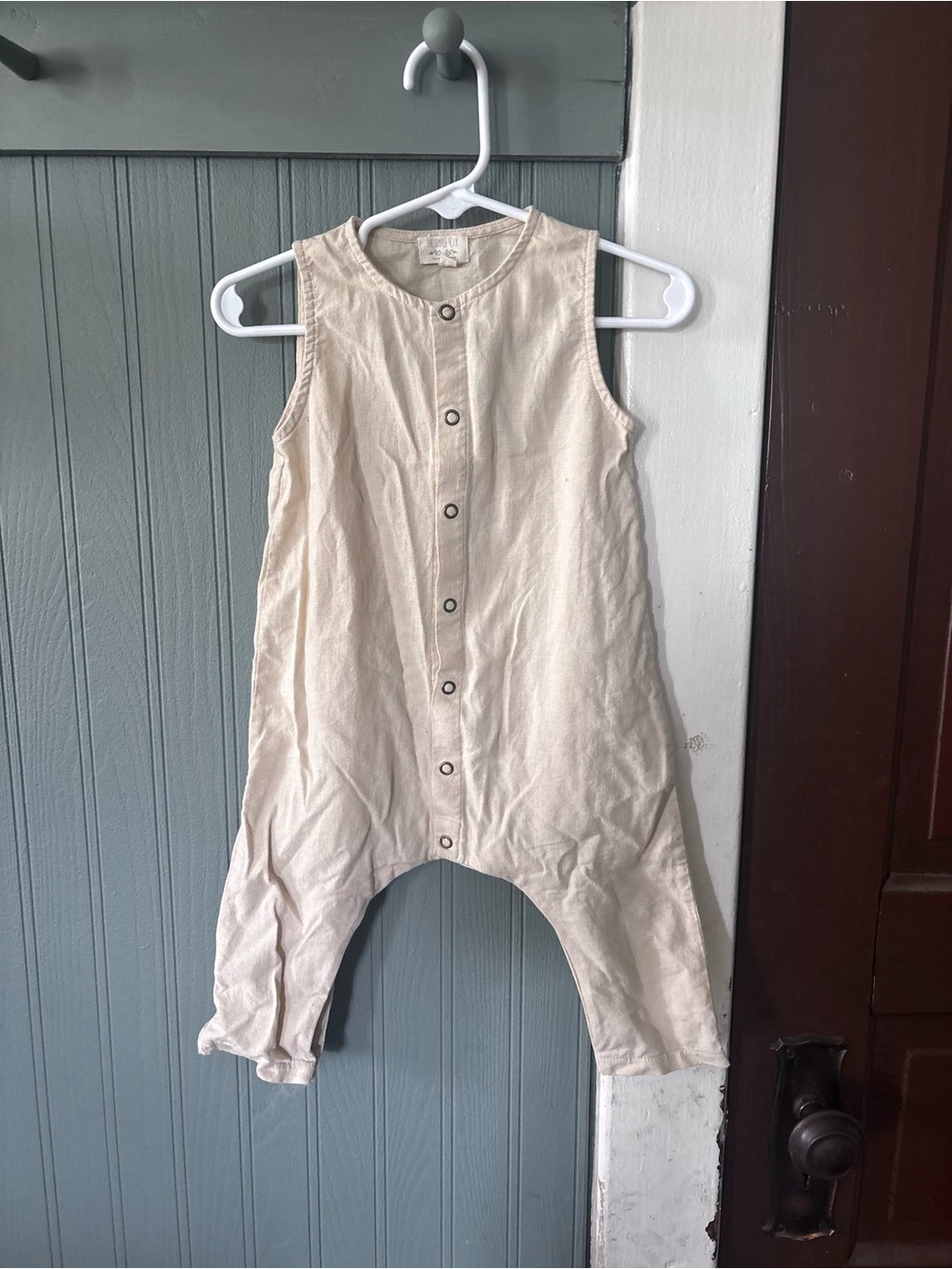 Sleeveless Cream Button-Front Baby Romper